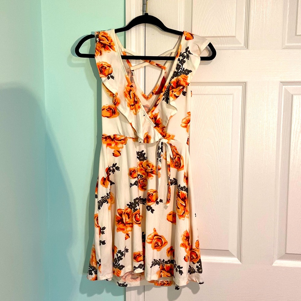A white medium with flowers dress